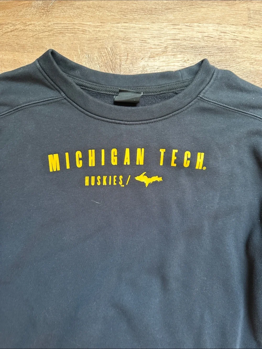 Nike Michigan Tech Huskies Black Pullover Sweatshirt with Yellow Lettering